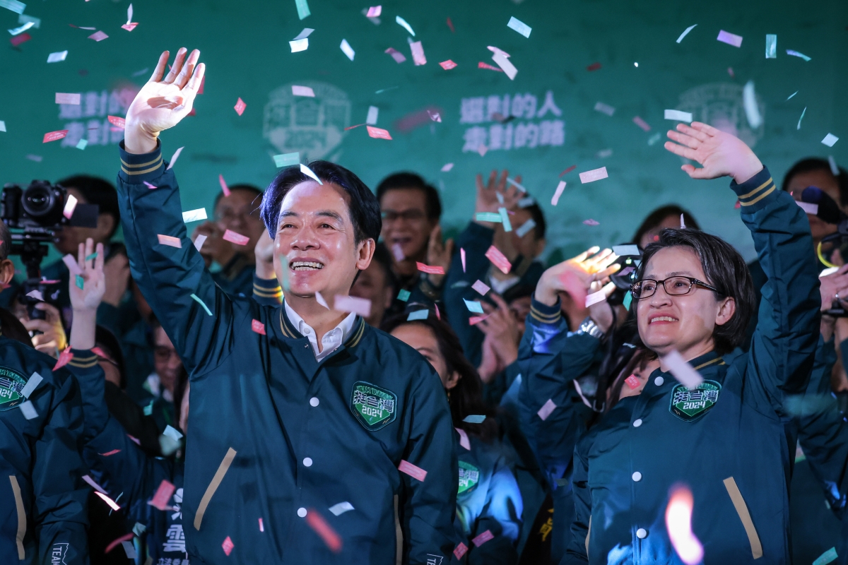 TAIPEI, TAIWAN - JANUARY 13: Confetti flies over the stage and crowd as Taiwan's Vice President and presidential-elect from the Democratic Progressive Party (DPP) Lai Ching-te (L) and his running mate Hsiao Bi-khim speak to supporters at a rally at the party's headquarters on January 13, 2024 in Taipei, Taiwan. Taiwan voted in a general election on Jan. 13 that will have direct implications for cross-strait relations. 
