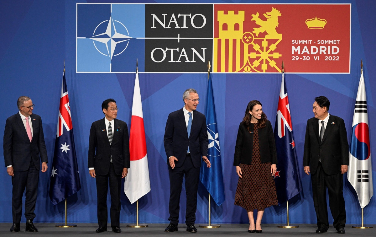 a group photograph ahead of a Indo-Pacific Partners meeting during the NATO summit