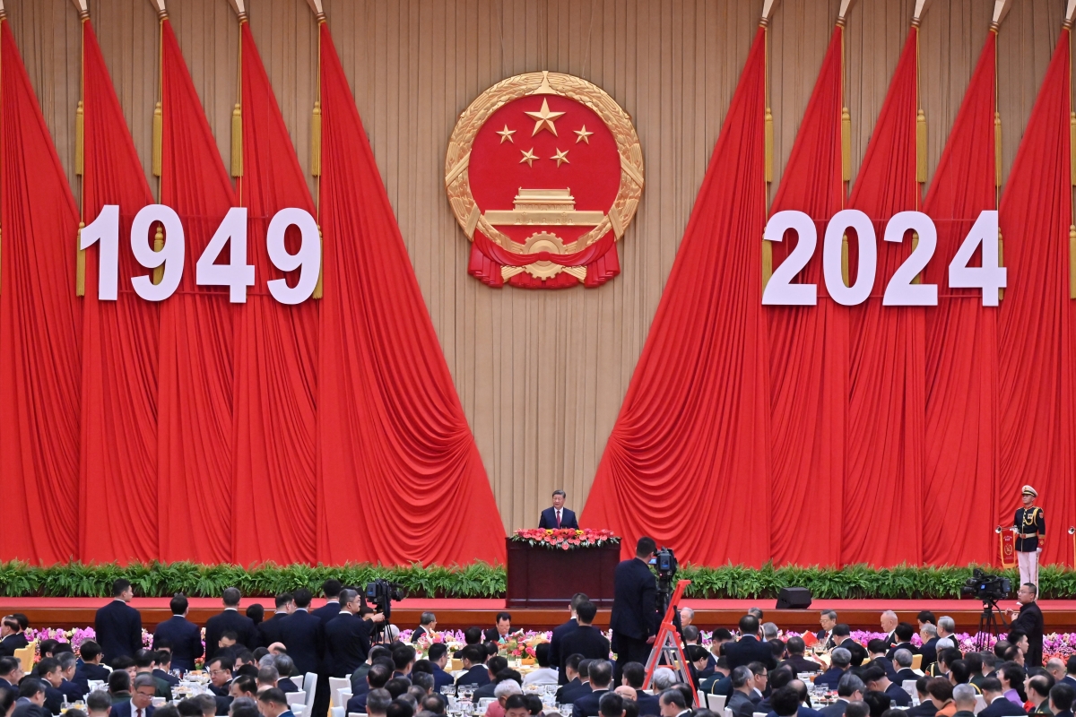 China's President Xi Jinping speaks during a National Day reception on the eve of the 75th anniversary of the People's Republic of China