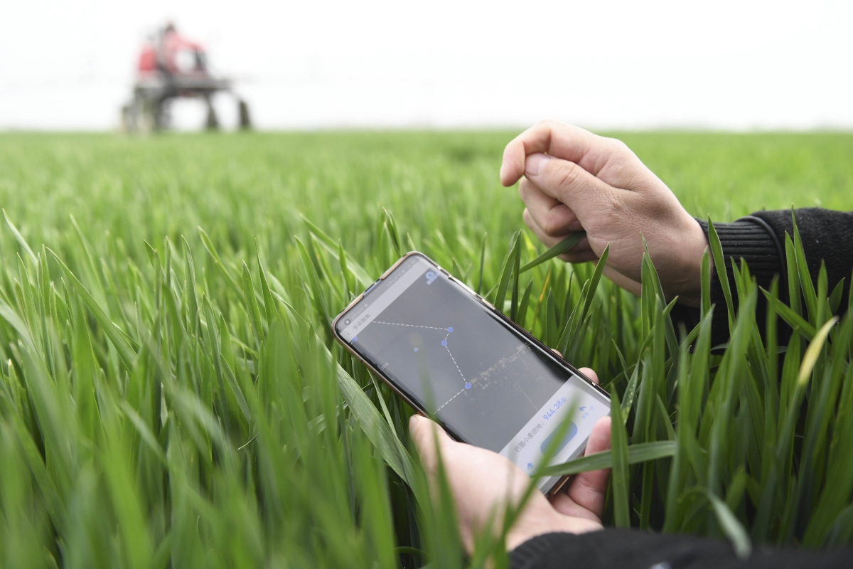 Satellite remote-sensing technology is used to help farmers during spring ploughing on March 17, 2021, in Anhui Province, China.