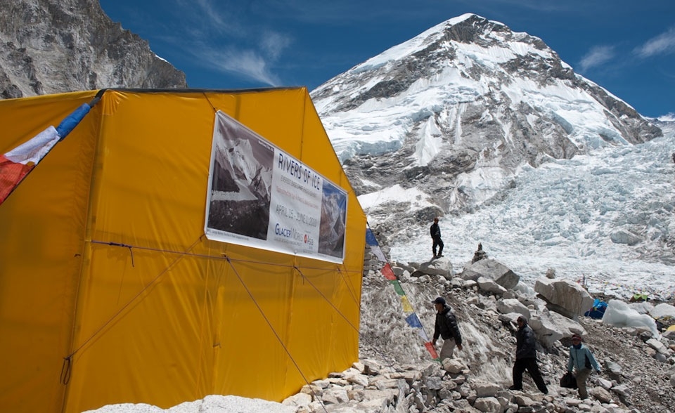 GRIP Photo Exhibit at Everest Base Camp.  Khumbu Icefall is seen behind the tent. (David Breashears)