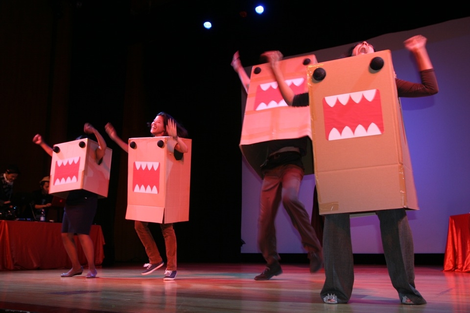 L to R: Charlene Manuel, Martha McGill, Davis Thompson-Moss, and Noopur Agarwal end the competition with a Domo dance. (Elaine Merguerian/Asia Society)