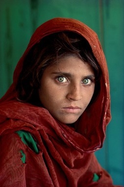 Sharbat Gula, “Afghan Girl,” at Nasir Bagh refugee camp near Peshawar, Pakistan, 1984. © Steve McCurry.