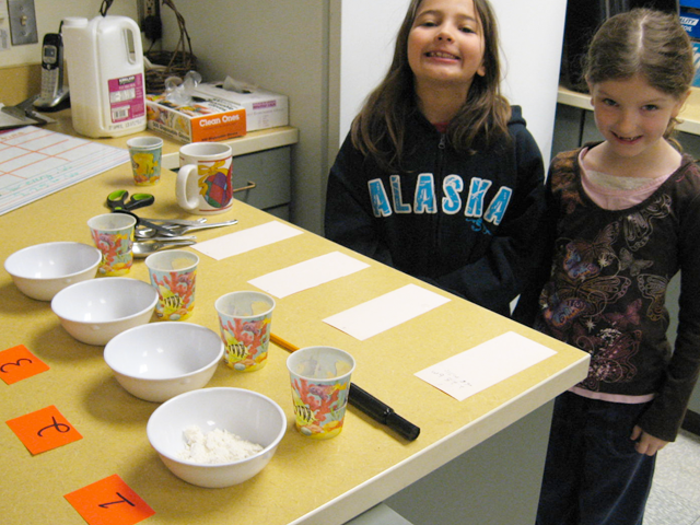 Children at the John Stanford School take part in an experiment, courtesy of Latona School Associates. (LSA)