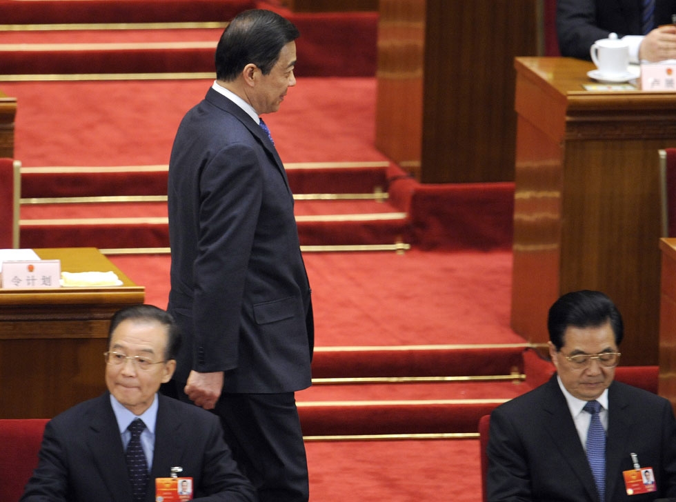 Bo Xilai (C), former Communist Party secretary of Chongqing arrives next to Chinese President Hu Jintao (R) and Premier Wen Jiabao (L) during the third plenary session of the National People's Congress's (NPC) annual session at the Great Hall of the People in Beijing on March 9, 2012. (Liu Jin/AFP/Getty Images)