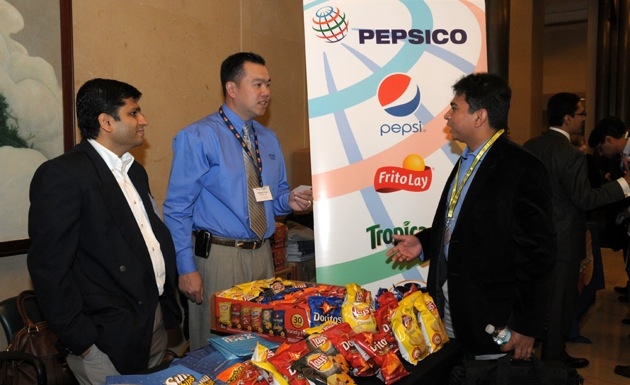 Participants at the PepsiCo display table.