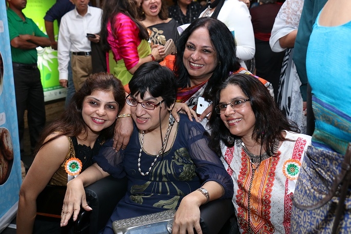 Malini Chib (center) with the team from ADAPT.