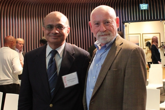 Chellaney and Schwartz pose for a photo. (Asia Society)