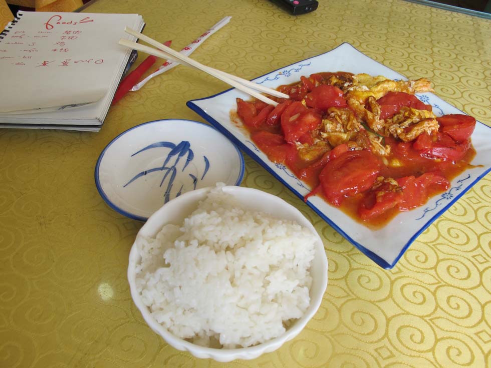 Tomato-egg stir fry with white rice, a common Chinese home dish. (Julia Dorff)