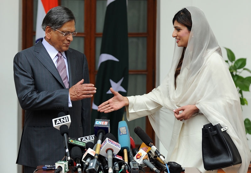 Pakistan Foreign Minister Hina Rabbani Khar (R) shakes hands with Indian Foreign Minister S. M. Krishna (L) prior to a meeting in New Delhi on July 27, 2011. (Prakash Singh/AFP/Getty Images) 