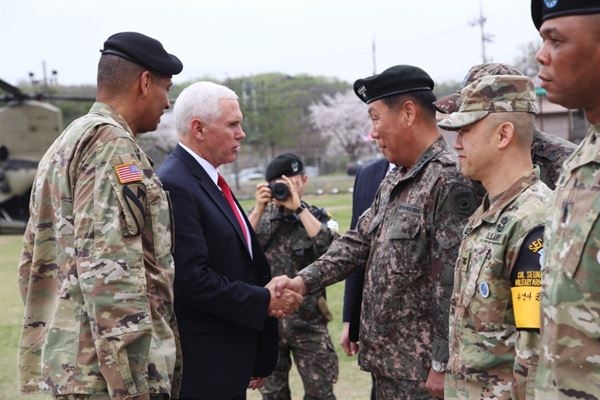 U.S. Vice President Michael R. Pence shakes hands with South Korean Gen. Leem Ho-Young, deputy commanding general of Combined Forces Command, near the demilitarized zone in South Korea, April 17, 2017. (Photo by U.S. Army Sgt. 1st Class Sean K. Harp)