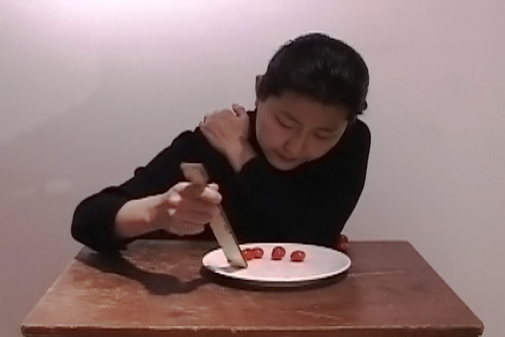 Eating (Self-Portrait) by Hye Yeon Nam, single channel video, 2006. Collection of the artist © Hye Yeon Nam
