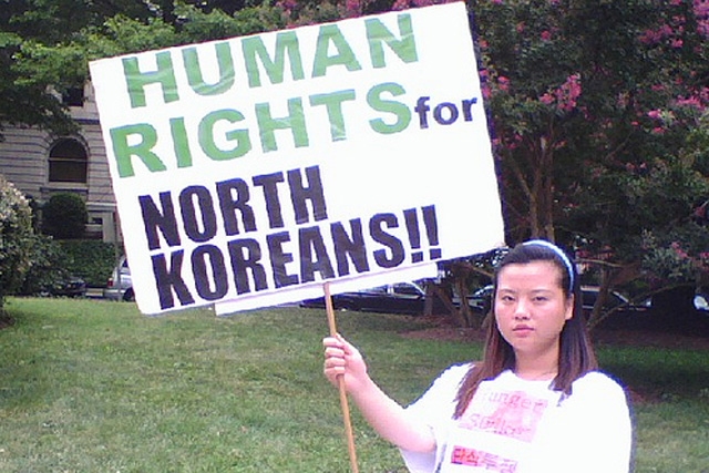 A demonstrator exhorts China to change its policies with regard to North Korean refugees. (FutureAtlas.com)