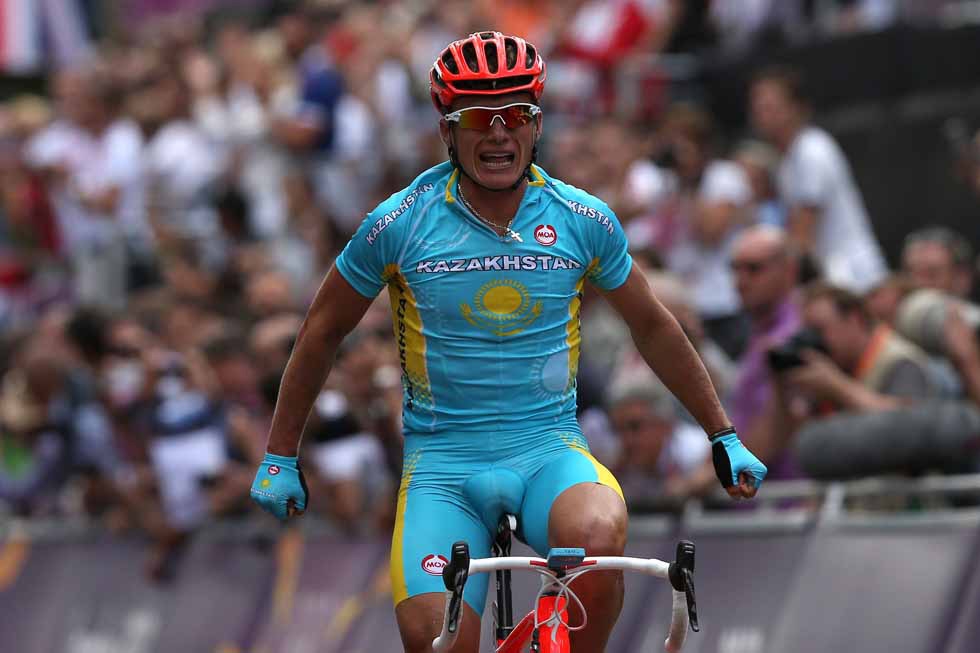 GOLD: Kazakhstan's Alexandr Vinokurov celebrates crossing the finish line to win the Men's Road Race Road Cycling on July 28, 2012. (Ezra Shaw/Getty Images)