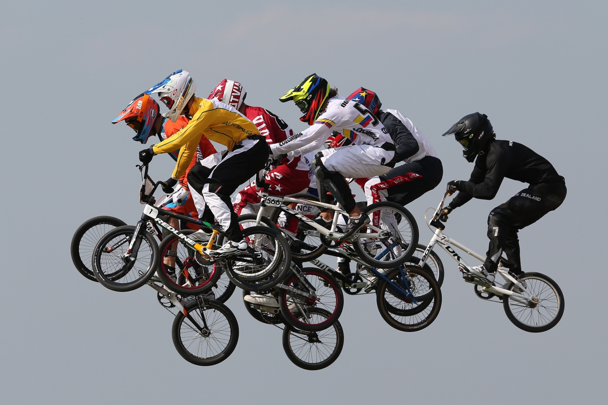 Sam Willoughby (2L) of Australia jumps with the field as they race in the Men's BMX Cycling semifinals on August 10, 2012. (Clive Brunskill/Getty Images)
