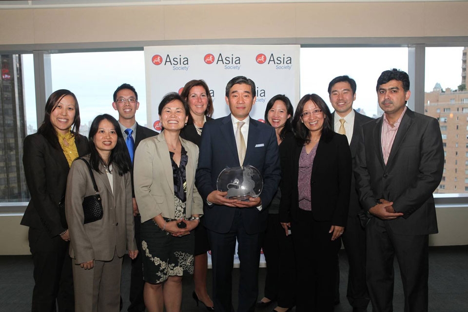 John Kim and New York Life Insurance Company delegates with the Award for Best Company for Support of the Asian Pacific American Community