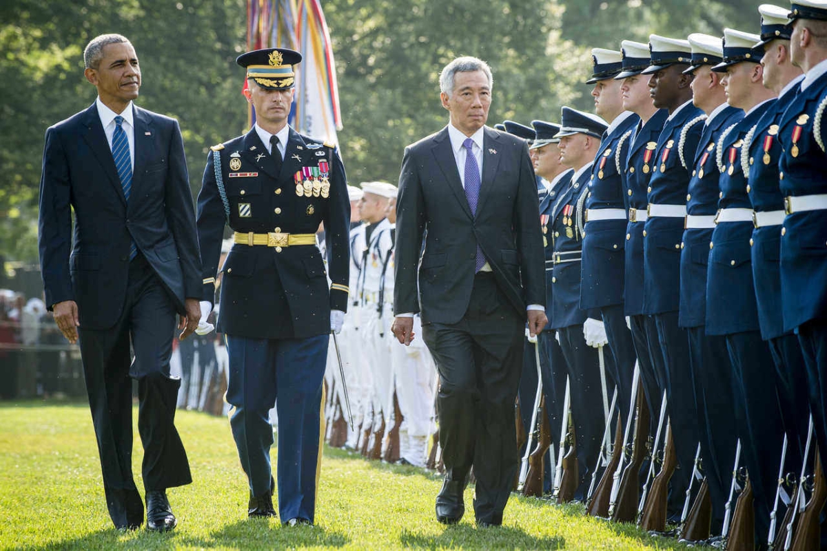 U.S. President Barack Obama and Prime Minister Lee Hsien Loong of Singapore review the troops during official welcoming ceremonies on the South Lawn of the White House on August 2, 2016 in Washington, DC . (Pete Marovich-Pool/Getty Images)