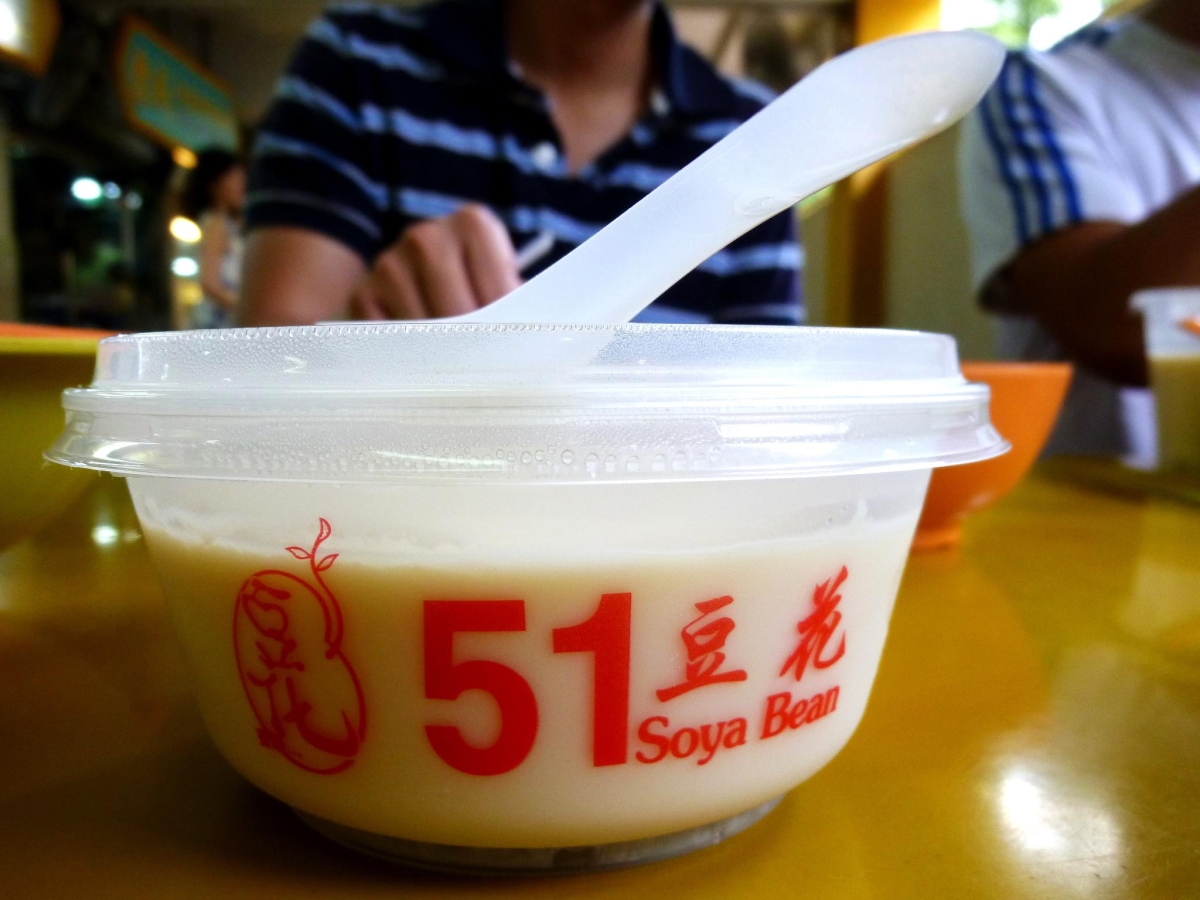 Soy beancurd, or "douhua," a Chinese dessert made of soft beancurd served with sugar syrup, and with the texture of very soft pudding. Found all over Asia and sold in plastic tubs, it's the Asian alternative to ice cream on a hot summer day. (Saki Yuen)