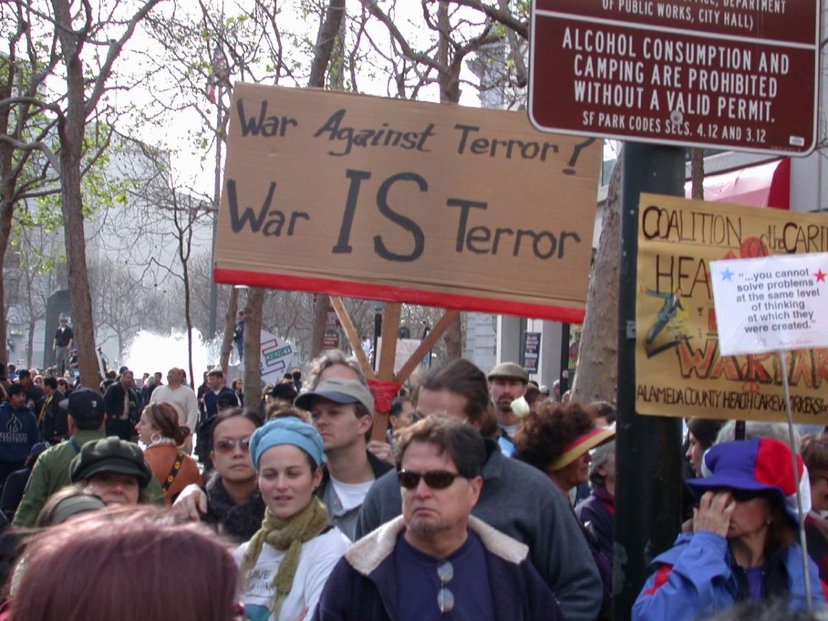 War against Terror: A sign held up by some commie protestors in San Francisco. (Chance Gardener/Flickr)
