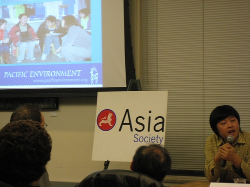 Wen Bo (left), co-director of Pacific Environment's China Program explains how local Chinese students are empowered to spread awareness of environmental dangers to their peers.