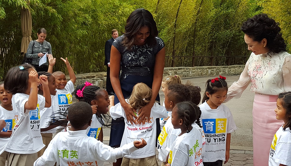 Pre-kindergarten students with U.S. First Lady Michelle Obama and China First Lady Peng Liyuan at the National Zoo for the panda Bei Bei's naming ceremony. (Yu Ying Public Charter School)