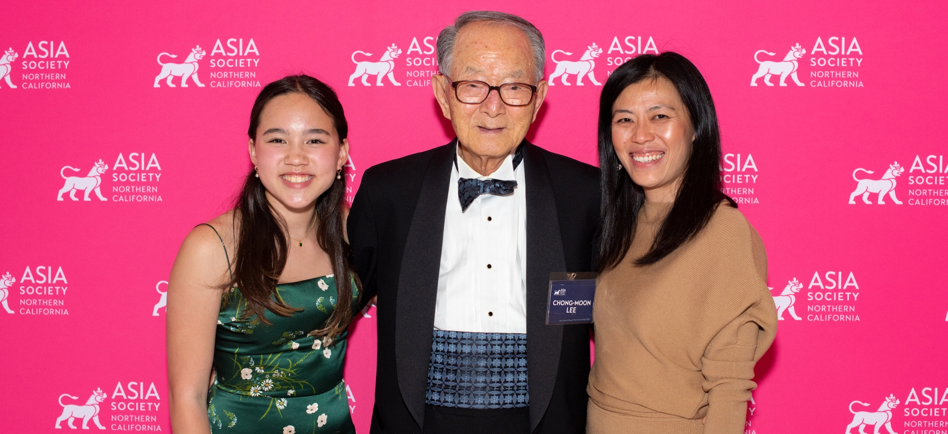 Asia Game Changer West Award Honorees Chong-Moon Lee, Tammy Ma, and Mina Fedor, Executive Director of AAPI Youth Rising pose for a photo in front of an Asia Society Northern Californa step and repeat. 