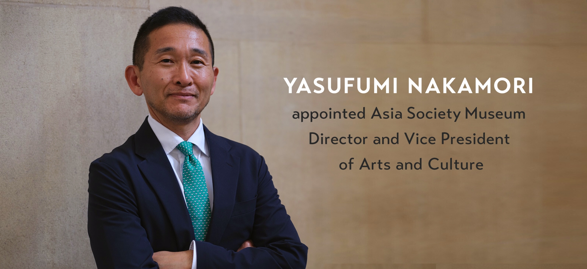 Photograph of an Asian man in a suit, next to text reading Yasufumi Nakamori named Asia Society Museum Director and Vice President of Arts and Culture