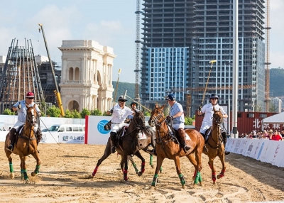 A match is underway at the “beach polo” event put on by SO! Dalian. Image courtesy of Lauren Greenfield for Asia Society's ChinaFile Magazine