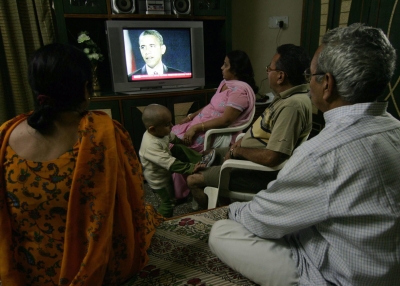 An Indian family watch television at home in Amritsar on November 5, 2008, as US President-elect Barack Obama addresses his election night victory rally. (Narinder Nanu/AFP/Getty Images)