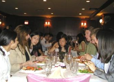 Members enjoying dinner at a similar ASYP event.
