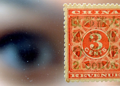 A 1897 Chinese red revenue stamp with an estimated value of $1.28 million