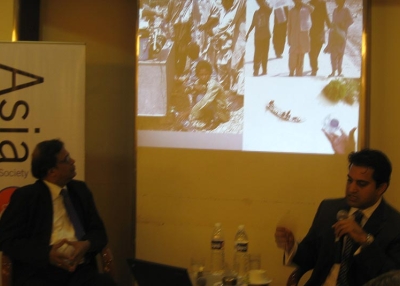Asher Hasan, CEO and founder of Naya Jeevan (R) speaks with P.G. Chakrabarti, Director of the SAARC (L), at Asia Society India Centre on November 12, 2010. (Asia Society India)