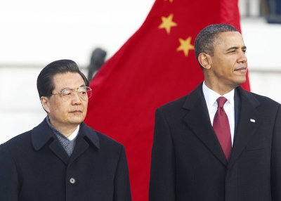 US President Barack Obama stands with Chinese President Hu Jintao (L) during a State Arrival ceremony on the South Lawn of the White House in Washington, DC, on Jan. 19, 2011. (Paul J. Richards/AFP/Getty Images)