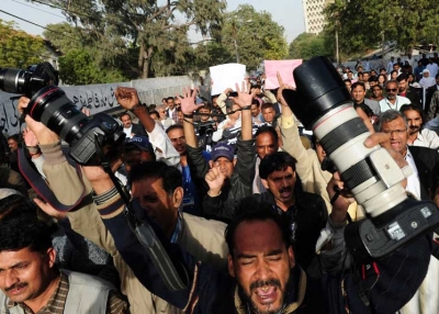 Pakistani journalists protest the killing of Wali Khan Babar, a reporter with local television channel Geo News, during a rally in Karachi on Jan. 14, 2011. Babar was believed to be yet another victim of ongoing targeted killings on Jan. 13 in Karachi. (Asif Hassan/AFP/Getty Images) 