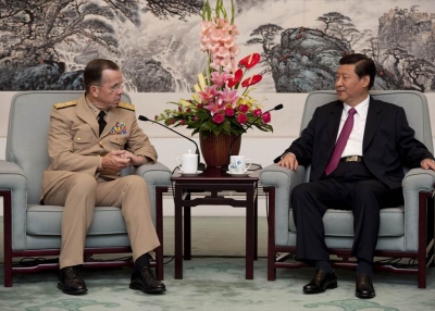  Chinese Vice President Xi Jinping (R), the presumptive heir to current President Hu Jintao, speaks with former Chairman of the Joint Chiefs of Staff Admiral Mike Mullen  in Beijing on July 11, 2011. Xi is just one of several new world leaders who could have a major impact on Asia in 2012 and beyond. Photo by Chad J. McNeeley. (Flickr/Chairman of the Joint Chiefs of Staff)