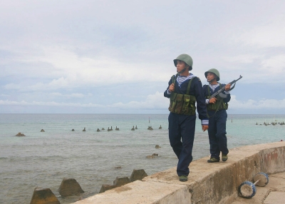 Vietnamese sailors patrol on Phan Vinh Island in the Spratly archipelago on June 14, 2011. Vietnam put on a show of military strength in the tense South China Sea on June 13, risking the ire of Beijing in the face of a deepening maritime rift with its powerful neighbor. (Vietnam News Agency/AFP/Getty Images) 