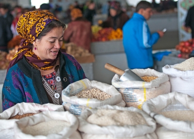 A woman sells grain in a bazaar in Ashkhabad, Turkmenistan on October 30, 2011. (Kerri-Jo/Flickr)