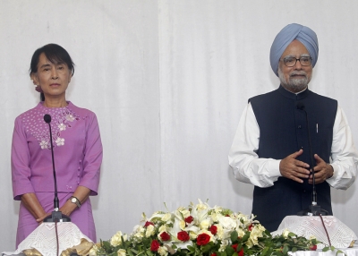 India's Prime Minister Manmohan Singh (R) addresses reporters during a joint press conference following his meeting with Myanmar opposition leader Aung San Suu Kyi at a hotel in Yangon on May 29, 2012. (Soe Zeya Tun/AFP/GettyImages)