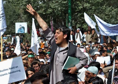 An Afghan youth shouts at an anti-U.S. protest in Kabul on Sept. 16, 2012, when students poured into the streets of Kabul to protest a film mocking Islam that has also sparked deadly riots in the Middle East and North Africa. (Massoud Hossaini/AFP/GettyImages) 