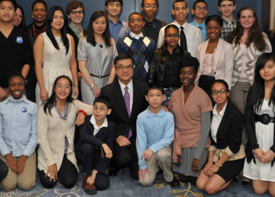 Gary Locke with Chinese language learners from secondary schools throughout the city that are a part of Asia Society's International Studies School's Network or the Confucius Classrooms Network, on Dec. 17, 2012. (Anthony Jackson) 