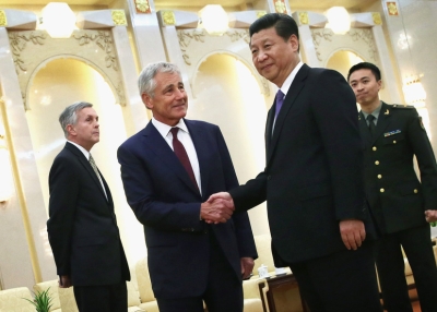 U.S. Secretary of Defense Chuck Hagel and Chinese President Xi Jinping shake