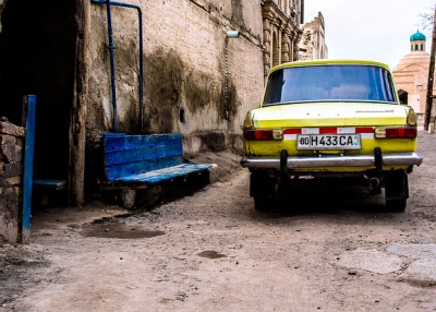 A beat up Russian Lada car parked on the streets of the 2,000 year old ancient city Bukhara, Uzbekistan on April 5, 2015. (Alex Steffler/Flickr) 