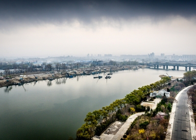 Boats bob up and down under the stormy grey sky in Pyongyang, North Korea on April 12, 2015. (ze Dirk/Flickr)