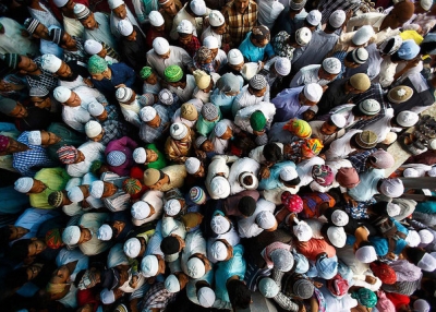 A group of visitors to a mosque photographed from above in Nepal on August 10, 2015. (umutrehberi/Flickr)