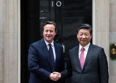 U.K. Prime Minister David Cameron (L) greets President Xi Jinping of China as he arrives in Downing Street on October 21, 2015 in London, England. (Carl Court/Getty Images)