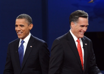 U.S. President Barack Obama (L) and former Massachusetts Governor Mitt Romney finish their debate at the University of Denver in Denver, CO on Oct. 3, 2012. (Saul Loeb/AFP/GettyImages) 