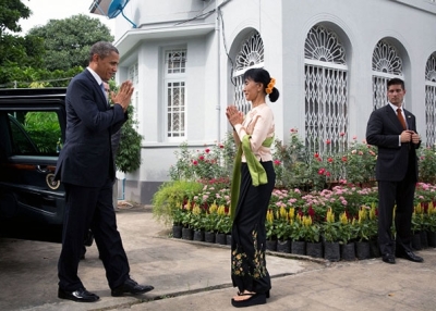 U.S. President Barack Obama is greeted by Aung San Suu Kyi during a stop at her private residence in Yangon on November 19, 2012. (Pete Souza/U.S. Department of State)