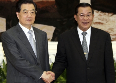 Then-President of China Hu Jintao (L) is welcomed by Cambodian Prime Minister Hun Sen (R) in Phnom Penh on March 31, 2012. Hu arrived in the Cambodian capital on a state visit to bolster ties between the already-close nations. (Pring Samrang/AFP/Getty Images) 