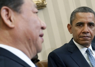 U.S. President Barack Obama, right, listens as then Chinese Vice President Xi Jinping speaks during a meeting in the Oval Office on Feb. 14, 2012. (Saul Loeb/AFP/Getty Images)