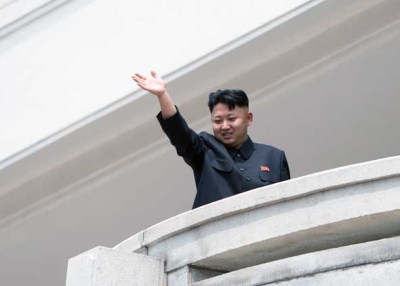North Korean leader Kim Jong Un, shown here reviewing a military parade in Pyongyang on July 27, could be waving goodbye to hopes from the international community that he would "behave better" in 2013.  (Ed Jones/AFP/Getty Images) 